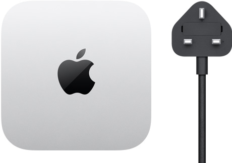 Mac mini, top, silver aluminum, square, rounded corners, glossy black Apple logo centered, black power cord with two-prong power plug
