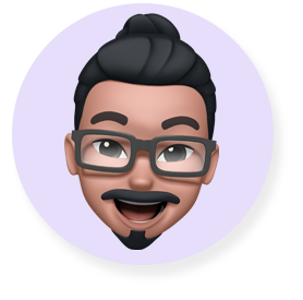 Memoji sorridente, um homem com barba e óculos